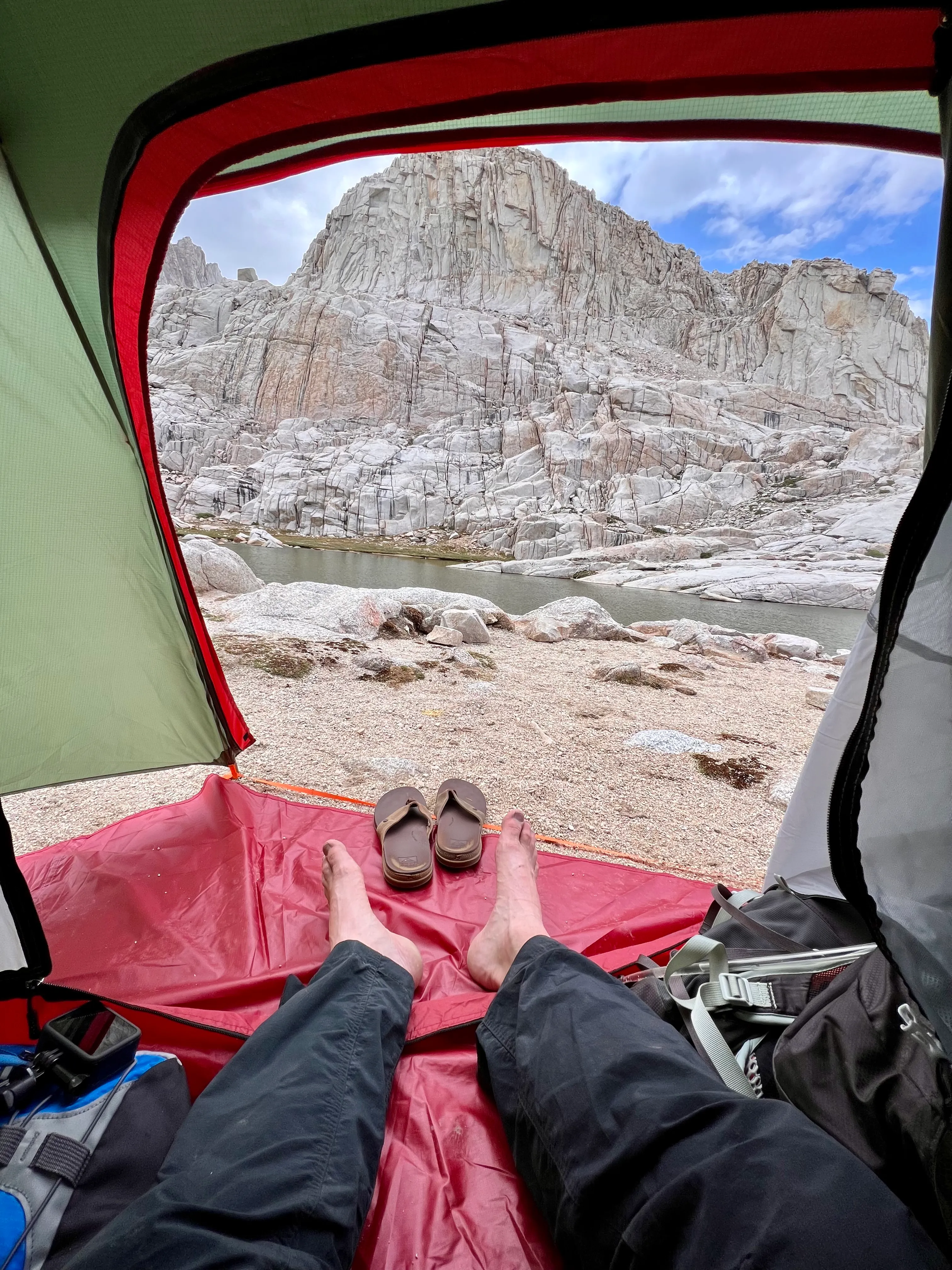 View from inside the tent at Trail Camp, granite walls and lake at 12,000 feet
